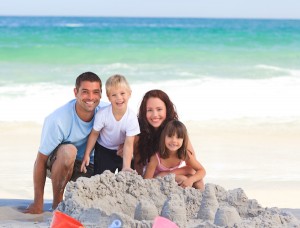 Family at the beach, Smiling, South Florida dentist